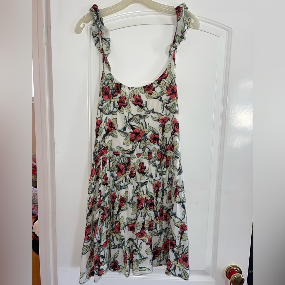 White/Cream free people dress with butterfly design, tie on sides to adjust fit